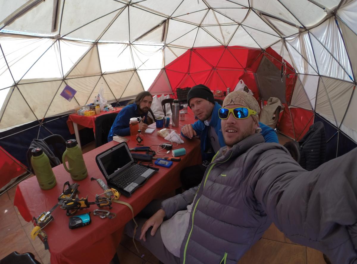 Sharping up crampons and chilling at BC  - Photo Maximo Kausch