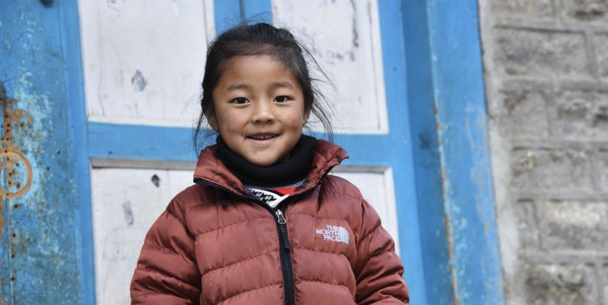 Kid giving pose for photo (c) John Alexander